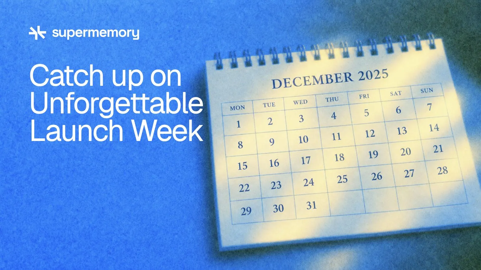 Supermemory header reading "Catch up on Unforgettable Launch Week" — A spiral-bound December calendar with weekday columns and dates